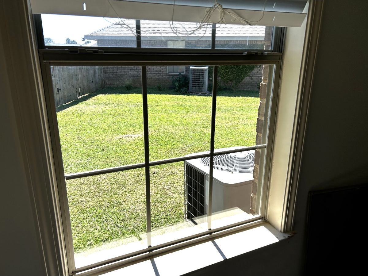 After: the same window with new glass installed